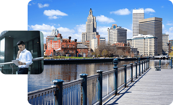 Right: Picture of Providence, RI, Left: Businessman outside building looking at tablet